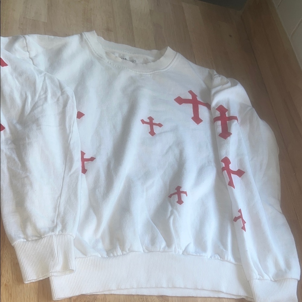 On Fire White Sweater with Red Cross Design